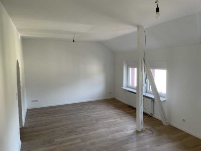 Komplett sanierte 3-Zimmer-Wohnung in zentraler Lage – mit zusätzlichem ausgebauten Dachgeschoss