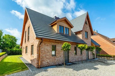 Neubau-Doppelhaushälfte in ruhiger strandnaher Lage (FW)