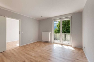 Hochwertig sanierte Wohnung mit Balkon, Tiefgarage und ruhiger Lage