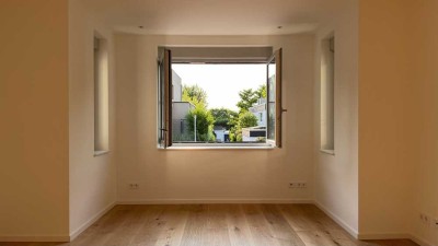 Luxuriöse Wohnung mit exklusiver Gartennutzung inkl. Terrasse – Erstbezug im Zweifamilienhaus