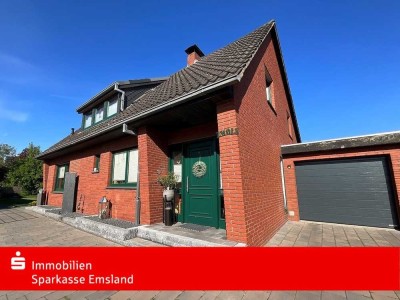 Einziehen und Wohlfühlen - 
Einfamilienhaus mit Gartenparadies in Twist-Siedlung
