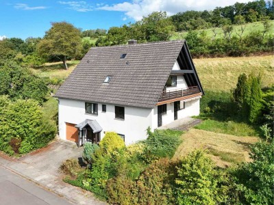 Einfamilienhaus am Feldrand mit Garten, Garage und Potenzial