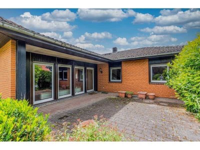 Jung & Kern Immobilien - Ein Bungalow zum Wohlfühlen – ruhig gelegen, mit viel Platz!