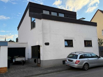 Freistehendes Einfamilienhaus mit vermieteter Einliegerwohnung in zentraler Lage von Viernheim