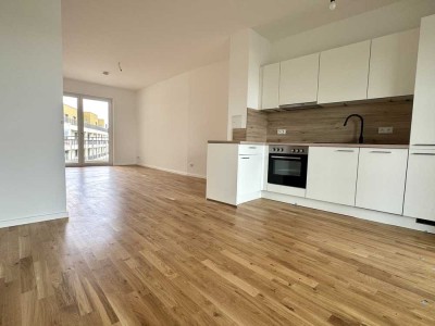Helle 2-Zimmer-Wohnung im Erstbezug mit EBK, Tageslichtbad mit Wanne und Balkon