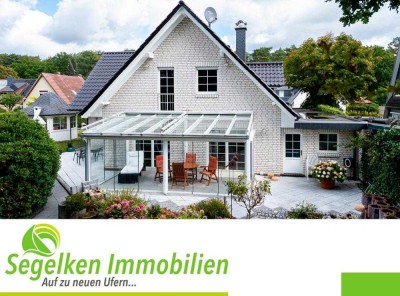 Wunderschönes und gut geschnittenes Einfamilienhaus mit Wintergarten und Carport