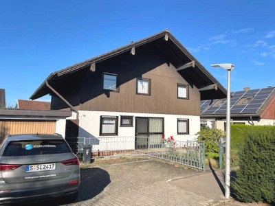 Familienleben unter einem Dach – Zweifamilienhaus mit Garten und Potenzial