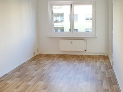 Eure familienfreundliche 3-Zimmer-Wohnung mit Balkon in grüner Lage!
