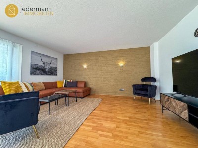 RÖTHIS: Stilvolle, sehr geräumige 3-Zimmer-Wohnung mit TG-Platz!