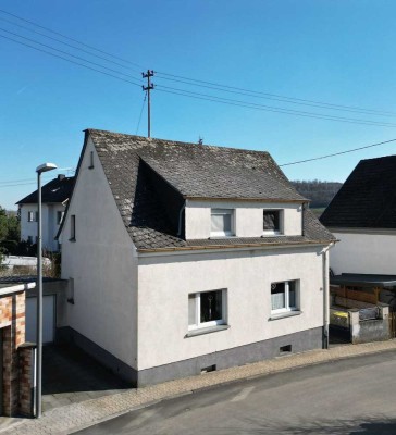 Freistehendes Einfamilienhaus mit großem Garten und viel Potenzial in Kretz