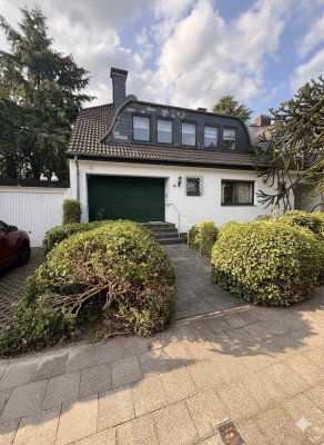 Stilvolle Doppelhaushälfte mit ELW auf parkähnlichem Grundstück