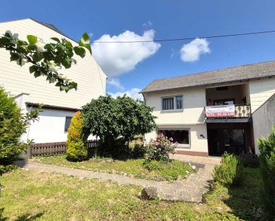 TOP-Preis-Leistungs-Verhältnis! Gepflegtes Wohnhaus mit Garten und Garage!