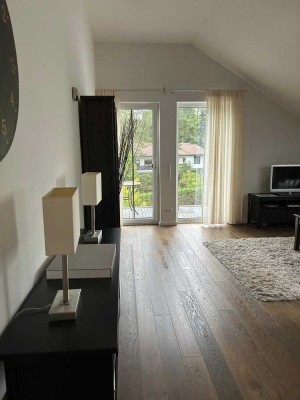 Exklusive 2-Zimmer-Dachgeschosswohnung mit großem Balkon, Wellnessbad, Aufzug und Tiefgarage