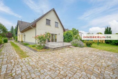 IMMOBERLIN.DE - Ansprechendes Haus mit Westgarten & Garage in harmonischer Lage
