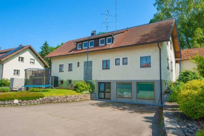 Doppelhaushälfte mit Einliegergewerbe in ruhiger Lage