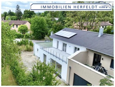 Erstbezug! Moderne Neubau-Dachterrassenwohnung mit Garage und Stellplatz in ruhiger, zentraler Lage