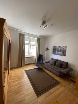 Möblierte 1-Zimmer-Wohnung mit Balkon in begehrter Lage