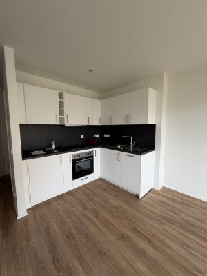 BESICHTIGUNG 18.12. 16 UHR!! Gartenwohnung im Neubau: 2-ZKB mit Einbauküche & FBH!