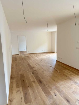 Erstbezug im Neubau - Balkon / Bodenheizung / Dusche & Wanne