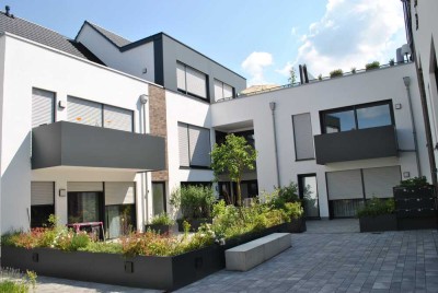 Drais: Neuwertige 2-Zimmerwohnung mit Einbauküche und Sonnenbalkon