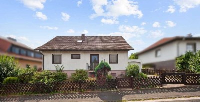 Gründau: Einfamilienhaus mit schönem Garten & Wintergarten in Top-Wohnlage