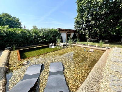 DER NÄCHSTE SOMMER KOMMT BESTIMMT - Bungalow mit Wohlfühlgarten und großem Parkplatz