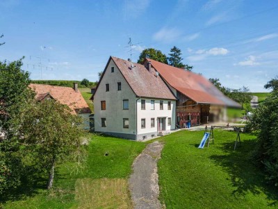 Mit großem Potential! Idyllisches Einfamilienhaus mit Ökonomiegebäude und großzügigem Grundstück