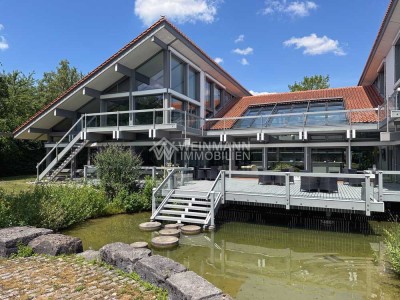 Gewerbeimmobilie auf Parkgrundstück – HUF-Architektur trifft auf Natur und Repräsentanz