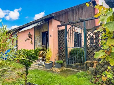 Gemütliches Einfamilienhaus im Ferienhausstil – Mit Kamin, Garten & Gartenhaus