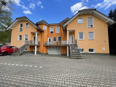 Beeindruckendes Mehrfamilienhaus mit drei Wohneinheiten mit, Terrasse, Tiefgarage und Garten!