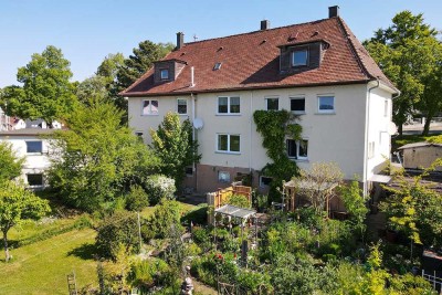 Attraktives Wohnhaus mit Gartenparadies • ideal für Generationenwohnen / Mieteinnahmen •