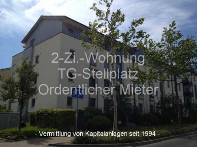 2-Zi.-Wohnung**Terrasse, Garten**TG-Stellplatz