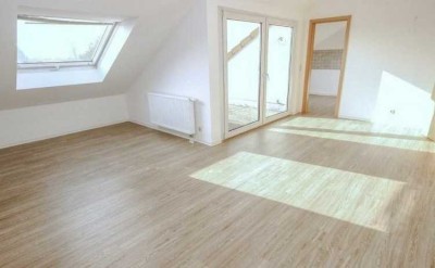 Geschmackvolle 3-Zimmer-Dachgeschosswohnung mit EBK in Langen
