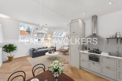 Kleiner aber feiner Erstbezug: Dachgeschosswohnung mit überdachter Terrasse auf Wohnebene