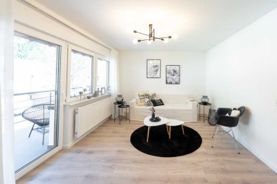ERSTBEZUG NACH SANIERUNG! Schöne, sanierte Eigentumswohnung mit Balkon, Terrasse und Grünfläche