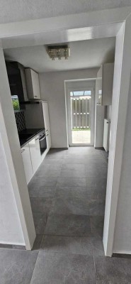 Charmante 2-Zimmer-Wohnung mit Garten, Terrasse und Kamin in Ellerau
