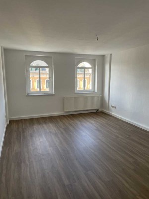 Sonnige Dachgeschosswohnung mit Tageslichtbad und Einbauküche