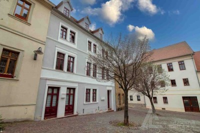Zentral gelegenes Mehrfamilienhaus + Sanierungsobjekt