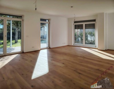 Moderne 3-Zimmerwohnung mit Gartenanteil (112m²) und Zugang zu Schwimmteich wartet auf Sie! Erstbezug