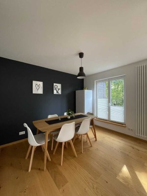 Moderne 2-Zimmer-Wohnung mit Garage und Garten