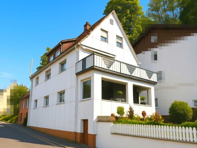 Solides Zweifamilienhaus mit Nebengebäude in idyllischer Lage von Tettau
