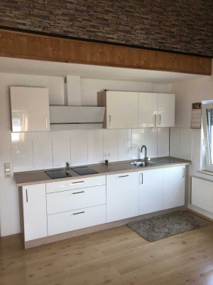 Gemütliche 3,5 Zimmer- Dachgeschosswohnung, Einbauküche, Niedrigenergiehaus.