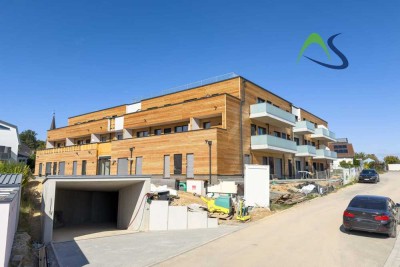 Moderne Dreizimmerwohnung mit Aufzug, Balkon, Abstellraum und Dachterrasse