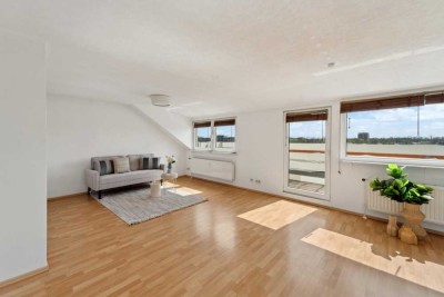 Attraktive 2,5-Zimmer-Wohnung im Dachgeschoss mit Weitblick |