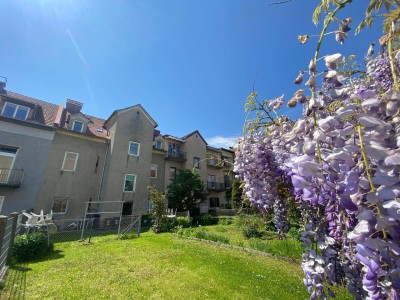 Zentrale 4-Zimmer-Wohnung mit Gartenanteil im Innenhof