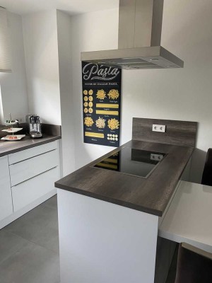 Neuwertige 2,5-Zimmer-Wohnung mit Terrasse und Garten in Lehrensteinsfeld