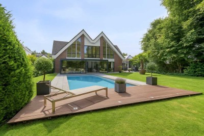 Architektur trifft Ambiente: Repräsentative Villa mit Parkcharakter in Hilden-Süd