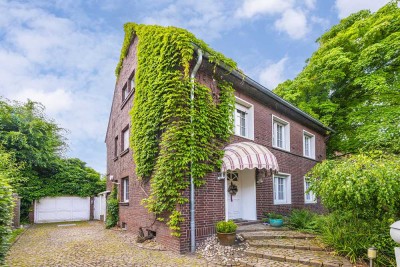 Charmante Backstein-Villa in begehrter Lage vor den Toren Düsseldorfs