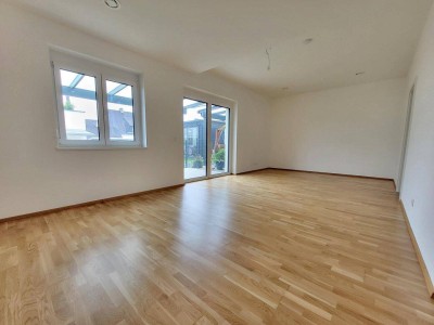 Moderne und Effiziente 3 Zimmer Erstbezugswohnung mit kleinem Eigengarten zum Vorführpreis