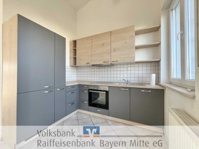 lichtdurchflutete DG-Wohnung mit EBK, sonniger Dachterrasse & Tiefgarage